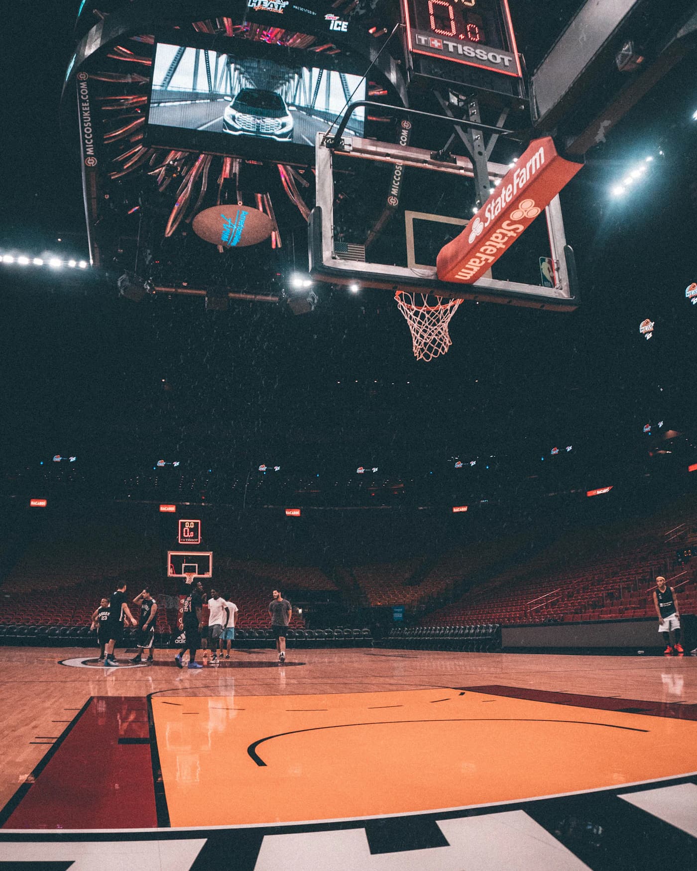 Basketball players on an indoor court